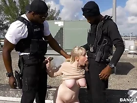 Witness Kiki Parker's intense interracial encounter with a black officer in a thrilling threesome
