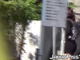 Young Japanese babes behind peeing on all sides of nearby conurbation