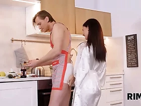 Kate Rich undresses and performs oral sex on her husband in the kitchen prior to bedtime